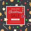 Christmas sale flyer template. Poster, card, label, background, banner on red frame with sweets on a wooden black table.