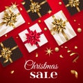Christmas sale with gift boxes and gold bow . Happy New Year decoration with confetti and light garland. Christmas Royalty Free Stock Photo