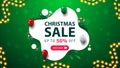 Christmas sale, green and white discount banner in liquid abstract shape with balloons, candy canes, garland and button