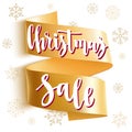 Christmas Sale. Holiday card with calligraphy, gold ribbon and decorative elements. Royalty Free Stock Photo