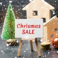 Christmas Sale of Real Estate. New Year discounts for buying housing. Purchase apartments at a low price. Holiday discounts. Royalty Free Stock Photo