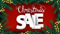 Christmas sale, red discount banner with large volumetric letters and frame of Christmas tree branches and garland