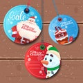 Christmas Sale Round Tags Set Special Offer Stickers On Wooden Textured Background Royalty Free Stock Photo