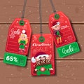 Christmas Sale Tags With Elfs On Wooden Textured Background Royalty Free Stock Photo