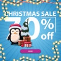 Christmas sale, up to 70% off, blue discount banner with Large numbers, button, garland and penguin in Santa Claus hat.