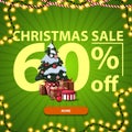 Christmas sale, up to 60% off, green discount banner with Large numbers, button, garland and Christmas tree in a pot with gifts Royalty Free Stock Photo