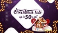 Christmas sale, up to 50% off, purple discount banner for website with decorative white large figures, garland.