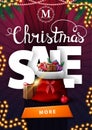 Christmas sale, vertical purple discount banner with large volumetric letters, garlands, button and Santa Claus bag with presents