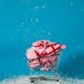 Christmas sales. Buying gifts for the new year, the concept. The shopping cart is full of gift boxes Royalty Free Stock Photo