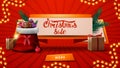 Christmas sales, discount banner in the form of ribbon with Santa Claus bag with presents, Christmas tree branch and button