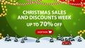 Christmas sales and discount week, up to 70% off, green horizontal discount banner with button, frame garland, pine winter forest Royalty Free Stock Photo