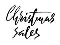 Christmas sales hand drawn lettering. Handmade calligraphy in white black color isolated on white background for your