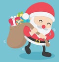 Christmas Santa Claus carrying big bag full with presents Royalty Free Stock Photo