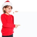 Christmas Santa Claus child kid girl pointing looking empty banner square copyspace Royalty Free Stock Photo