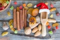 Christmas Santa Claus hat with dried fruits and nuts on wooden background Royalty Free Stock Photo