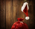 Christmas Santa Claus Hat Hanging On Wood Wall, Xmas Concept