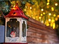 Christmas santa claus lantern with yellow lights in the background Royalty Free Stock Photo