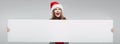 Christmas Santa hat isolated woman portrait. Royalty Free Stock Photo