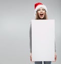 Christmas Santa hat isolated woman portrait. Royalty Free Stock Photo