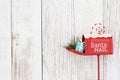 Christmas Santa mailbox on weathered wood holiday background Royalty Free Stock Photo