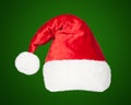 Christmas Santa red hat isolated on green Royalty Free Stock Photo