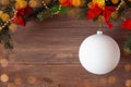 Christmas santas cam white ball with Christmas decorations and bokeh on wooden background, mockup, flat lay, copy space Royalty Free Stock Photo