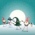 Christmas scandinavian gnomes and snowman on moonlight winter scene Royalty Free Stock Photo