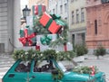 Christmas scene in Riga, Latvia. Car boot filled with Christmas presents. Old Riga. December in Latvia Royalty Free Stock Photo