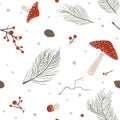 Christmas seamless pattern with fly agaric mushrooms, pine cone and branches, and red berries on white background Royalty Free Stock Photo