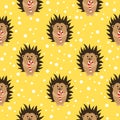 Christmas seamless pattern. The hedgehog holds a lollipop in its paws. Vector.
