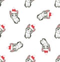 Christmas seamless pattern with the image of little cute kittens in the hat of Santa Claus. Royalty Free Stock Photo