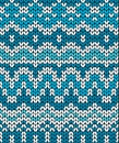 Christmas seamless pattern. Knitting traditional texture. Blue winter background. Royalty Free Stock Photo