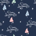 Christmas seamless pattern, with lettering and hand drawn Christmas trees on deep blue background Royalty Free Stock Photo