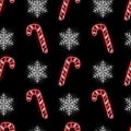 Christmas seamless pattern with neon candy canes and snowflakes on black background. Winter holidays, X-mas, Boxing day, New Year