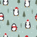 Christmas seamless pattern With penguins and pine trees on blue background