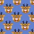 Christmas seamless pattern with reindeer. Deer head cartoon on blue background. Christmas magic animal. Cute wrapper paper Royalty Free Stock Photo