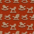 Christmas seamless pattern with rocking toys horses Royalty Free Stock Photo