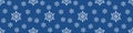 Christmas seamless pattern with snowflakes on pastel blue background. wide banner