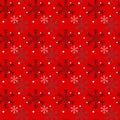 Christmas seamless pattern of snowflakes on red background. Vector.