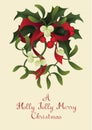 Christmas seasonal greeting card with a A Happy Joyful Merry Christmas and Misletor