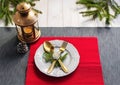 Christmas serving table. Traditional festive decoration background top view. Cutlery utensils beautiful plates decorative elements