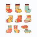 Christmas Set Of Colorful Warm Knitted Socks And Winter Shoes. Winter Stylish Woolen Clothing With Norwegian Ornaments