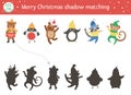 Christmas shadow matching activity for children. Winter puzzle with cute animals in warm clothes. New Year educational game for