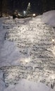 Christmas Sheet Music In The Snow, The Notes Illuminated By Street Lights. Generative AI Royalty Free Stock Photo