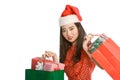 Christmas shopping of Asian woman with gift bags Royalty Free Stock Photo