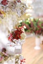 Christmas shopping background of window decoration and gift shop. Xmas tree shining decor selling in mall. Soft focus.