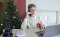 Christmas shopping online. Buyer makes an order from a smartphone, sale for winter holidays Royalty Free Stock Photo