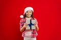 Christmas shopping. New year party. Santa claus kid. Happy winter holidays. Small girl. Present for Xmas. Childhood Royalty Free Stock Photo