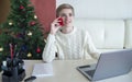 Christmas shopping online. Buyer makes an order from a smartphone, sale for winter holidays Royalty Free Stock Photo