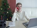 Christmas shopping online. Buyer makes an order from a smartphone, sale for winter holidays Royalty Free Stock Photo